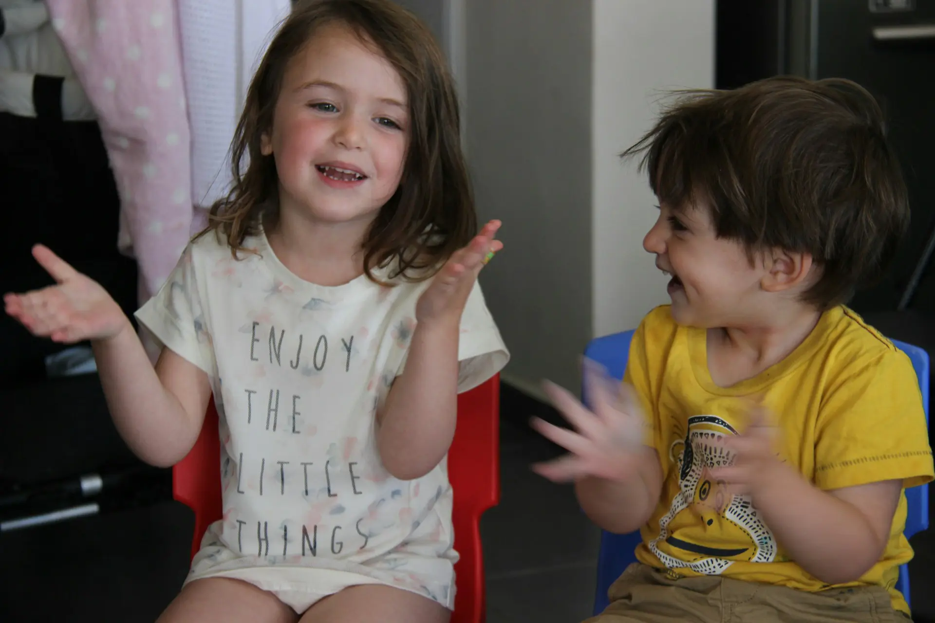 A group of children in a room undergoing speech therapy session.